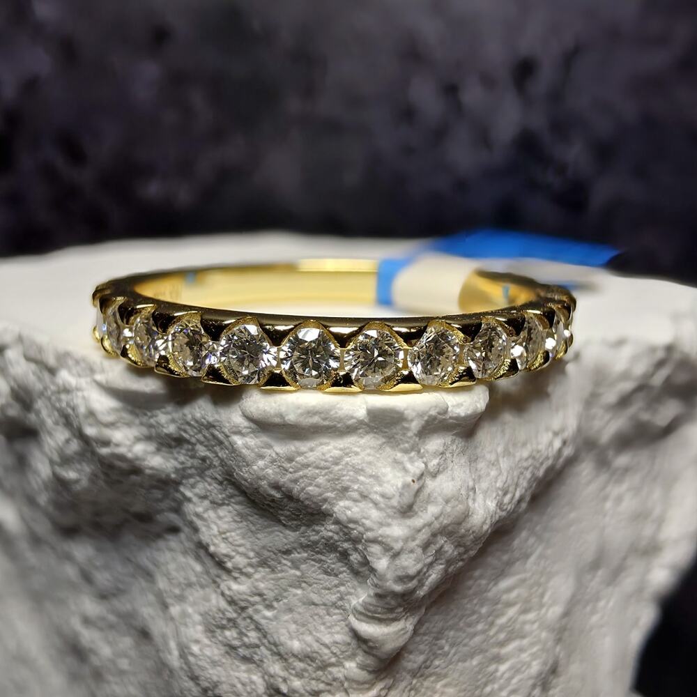 0.90 CTW D/VVS Round Moissanite Eternity Band in Gold Over Silver (Size 8)